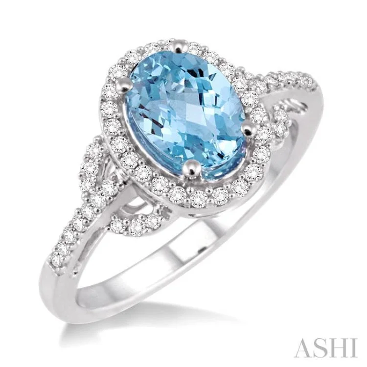 Women’s romantic engagement rings-8x6MM Oval Cut Aquamarine and 1/3 Ctw Round Cut Diamond Ring in 14K White Gold