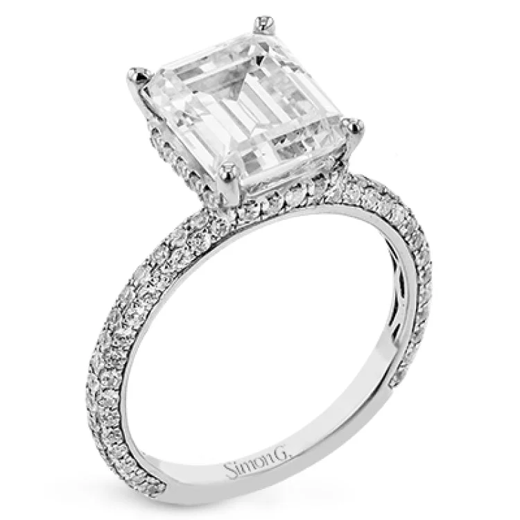 Women’s emerald-cut diamond engagement rings-This stunning engagement ring from our under halo collection is set with 0.80 ctw of pave set diamonds in 18 kt white gold.