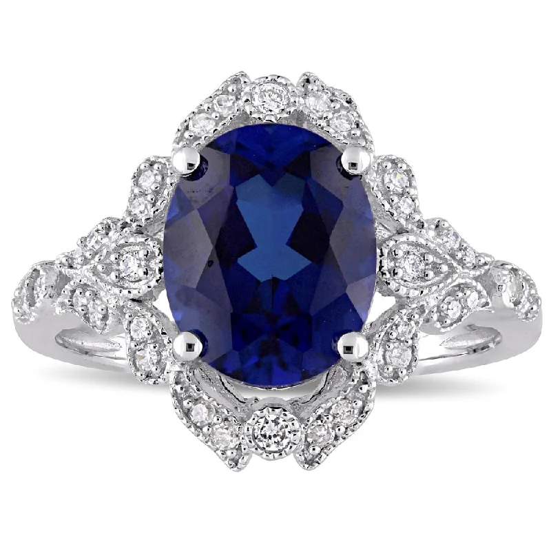 Women’s matching ring-Miadora 10k White Gold Created Blue Sapphire and 1/5ct TDW Diamond Vintage Halo Cocktail Ring