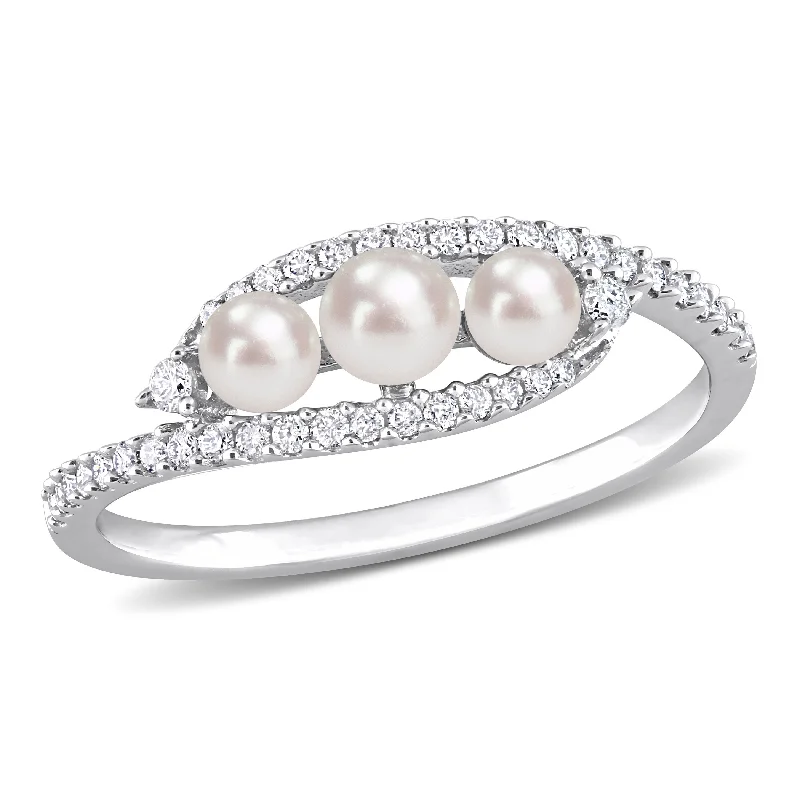 Women’s bold ring-Miadora Cultured Freshwater Pearl and 1/5ct TDW Diamond Bypass Ring in 14k White Gold