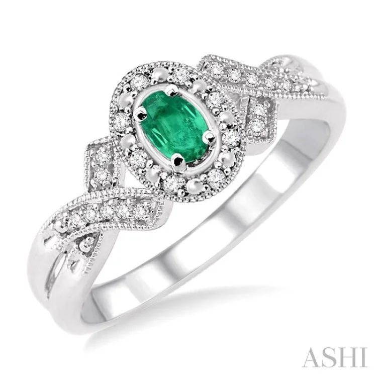 Women’s engagement rings with side stones-5x3 mm Oval Cut Emerald and 1/50 Ctw Single Cut Diamond Ring in Sterling Silver