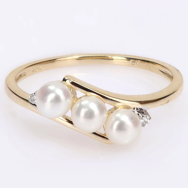 Women’s platinum ring-Miadora 10k Yellow Gold Cultured Freshwater Pearl & Diamond Accent 3-Stone Bypass Ring (3.5-4mm)