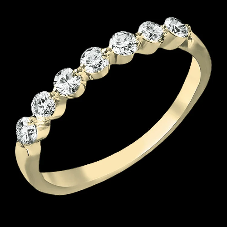 Women’s personalized engagement rings-The perfect compliment to a solitare, this 7-stone diamond wedding band in 14K yellow gold adds just the right amount of sparkle