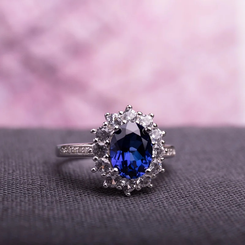 Women’s diamond halo ring-4ct TGW Created Blue and White Sapphire Diamond Halo Ring in Sterling Silver by Miadora