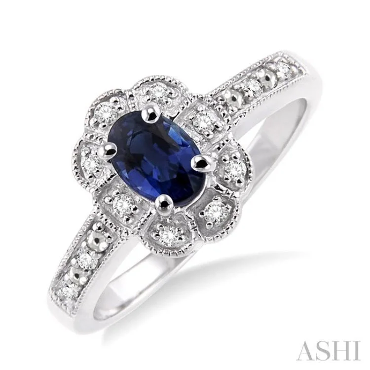 Women’s platinum engagement rings-6x4 mm Oval Cut Sapphire and 1/20 ctw Single Cut Diamond Ring in Sterling Silver