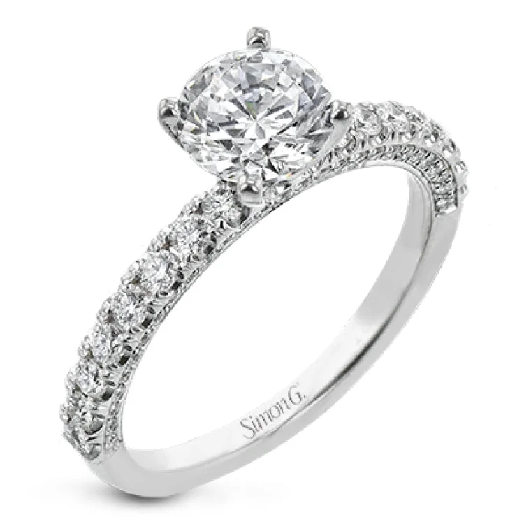 Women’s antique engagement rings-This engagement ring is sure to shine, with a classic straight design set with .49 ctw of white side diamonds.