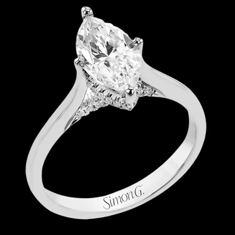 Women’s affordable engagement rings-This elegant white gold engagement ring takes an marquise center and is adorned with a delicate under halo, and a line of diamonds on the side profile 0.13 ctw