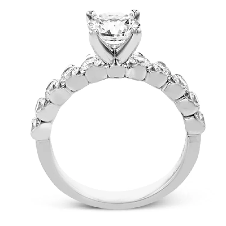 Women’s wedding and engagement rings-18K diamond engagement ring 0.90 ctw., features a half bezel setting on each individual side diamond which adds a modern bubble look to this ring