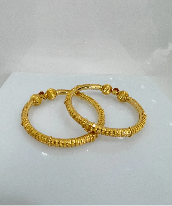 Women’s luxury charm bracelet-21k Gold Hinged Bangles