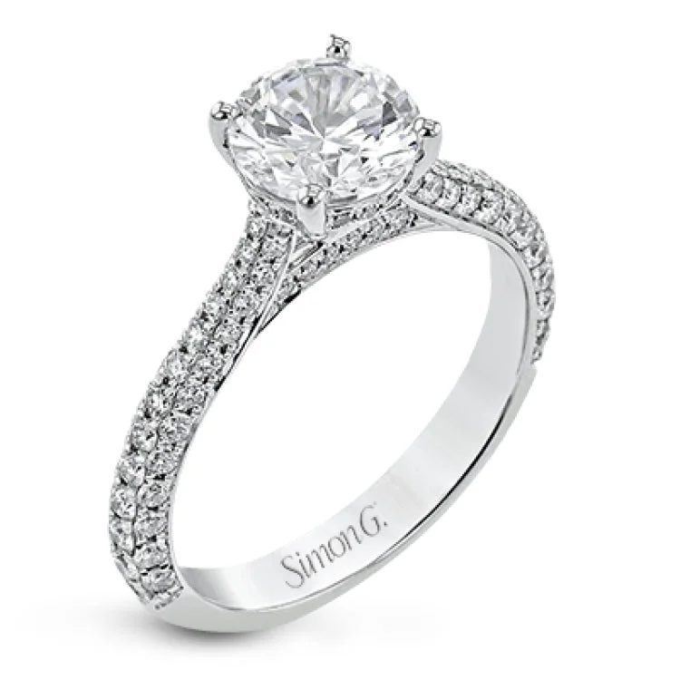 Women’s solitaire engagement ring with diamonds-This stunning 18K engagement ring has pave set diamonds of 0.66 ctw., on all 3 sides for a sleek look