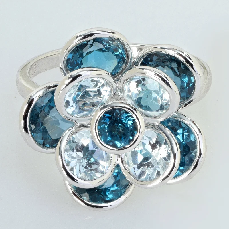 Women’s statement gemstone ring-Miadora 7 1/3ct TGW London and Sky Blue Topaz Flower Ring Sterling Silver