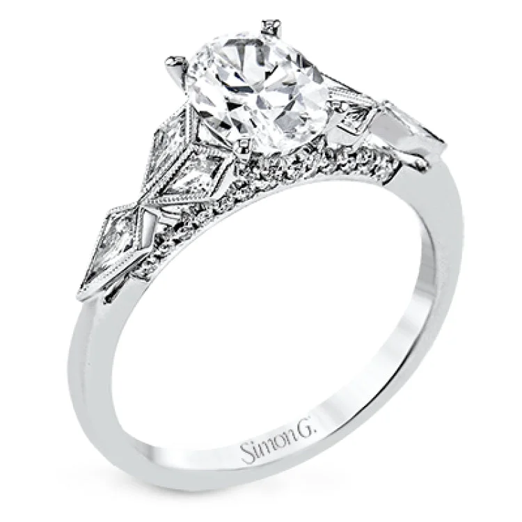 Women’s statement engagement rings-A truly unique piece, this modern engagement ring is made for an oval center and flanked by kite set diamonds 0.37 ctw, with round diamonds on the profile and hidden halo 0.13 ctw.